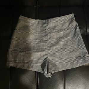 High waisted black and white striped mini shorts